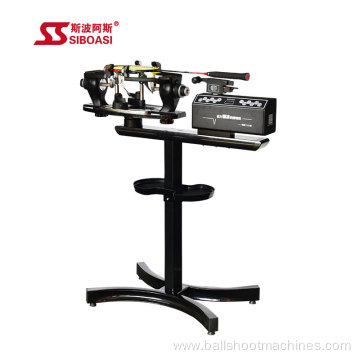 Stringing machine for tennis and badminton rackets